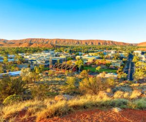 Anzac Hill Memorial lookout: aerial view of Alice Springs in Australia. Located in Red Centre desert with Macdonnell ranges of Northern Territory.